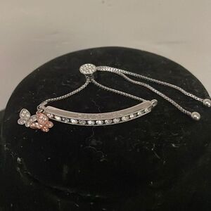 8” adjustable silver tone bracelet w/crystals & charms & engraved “DAUGHTER”